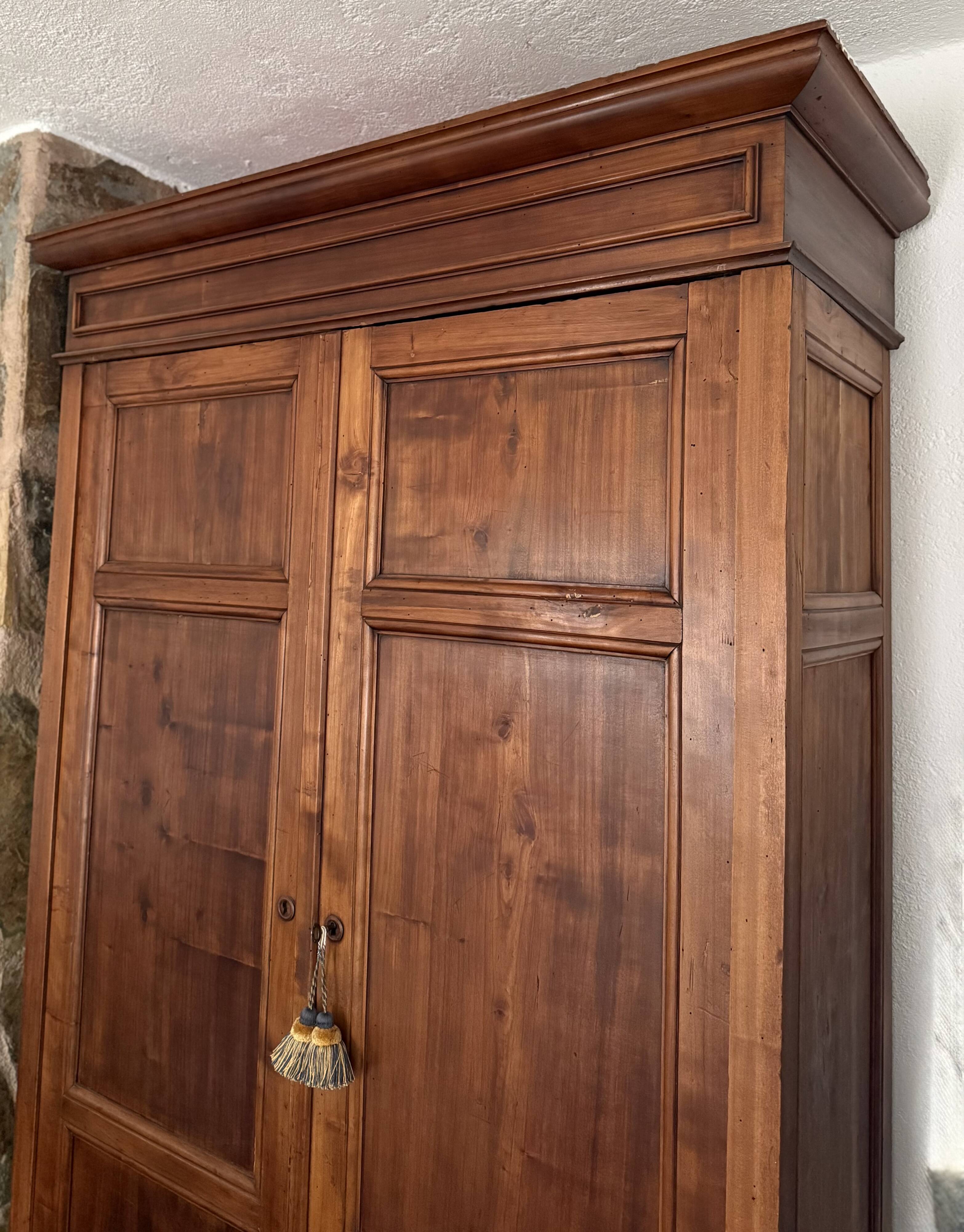 Antique solid wood wardrobe, rustic, with drawers and original key.