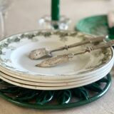 4 ironstone plates.