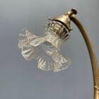 French art nouveau table lamp with transparent glass shade