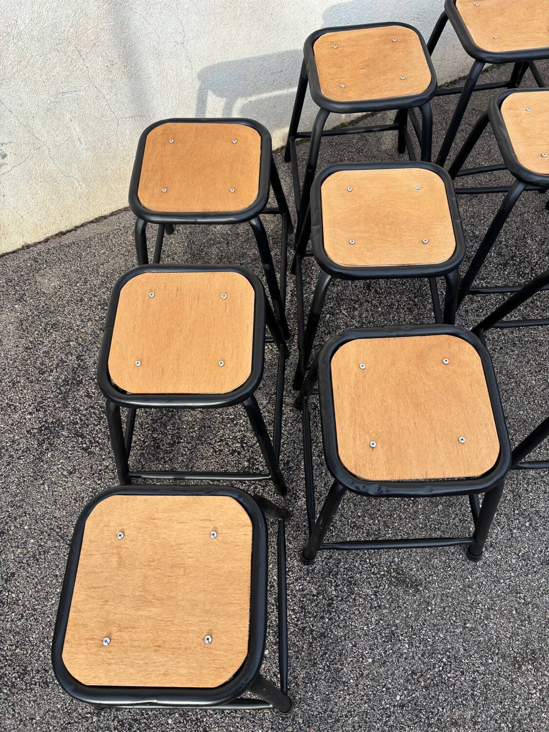 Set of 12 black industrial stools