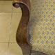 Two Louis XV style wooden and fabric armchairs