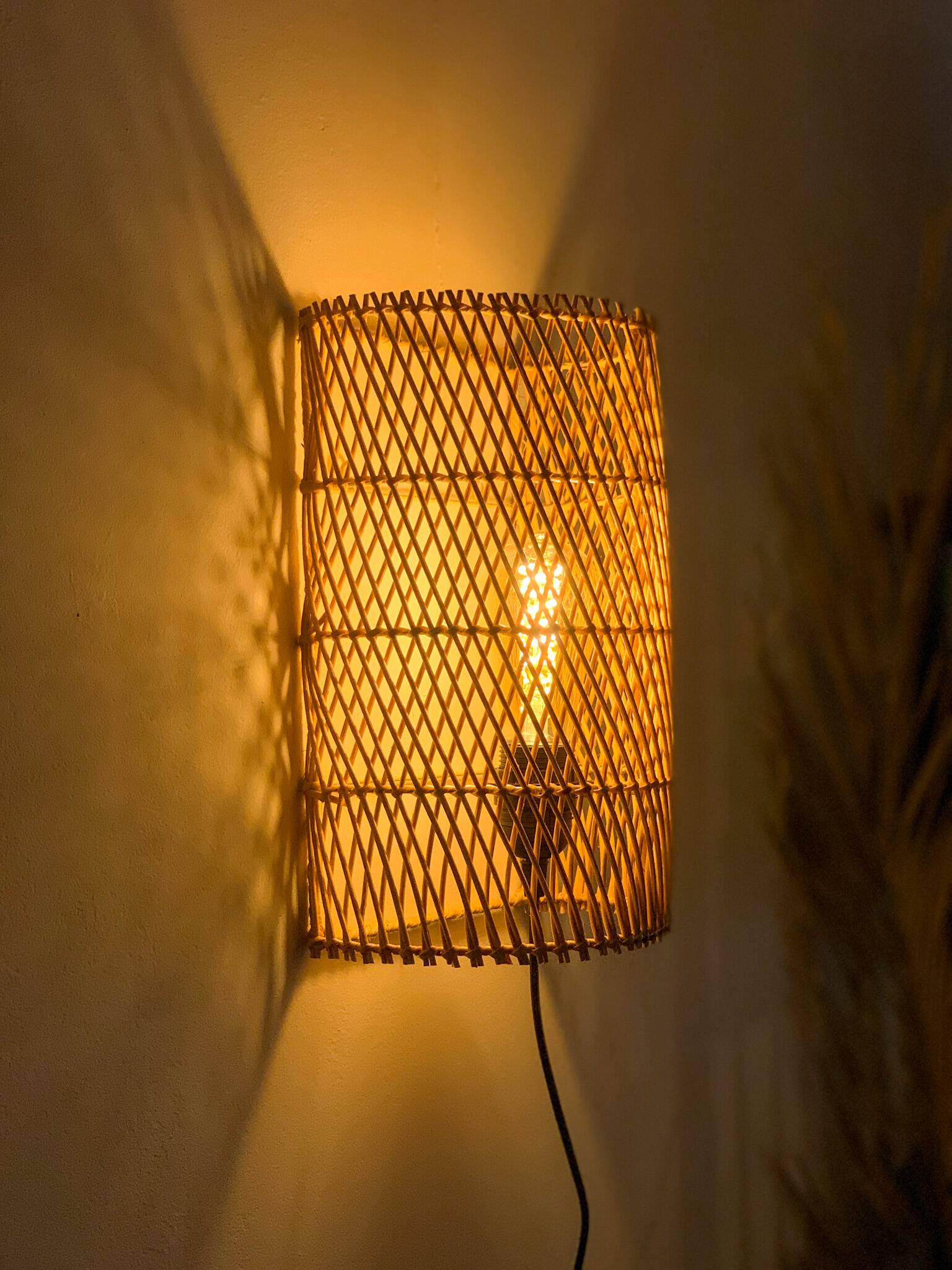 Natural rattan wall light