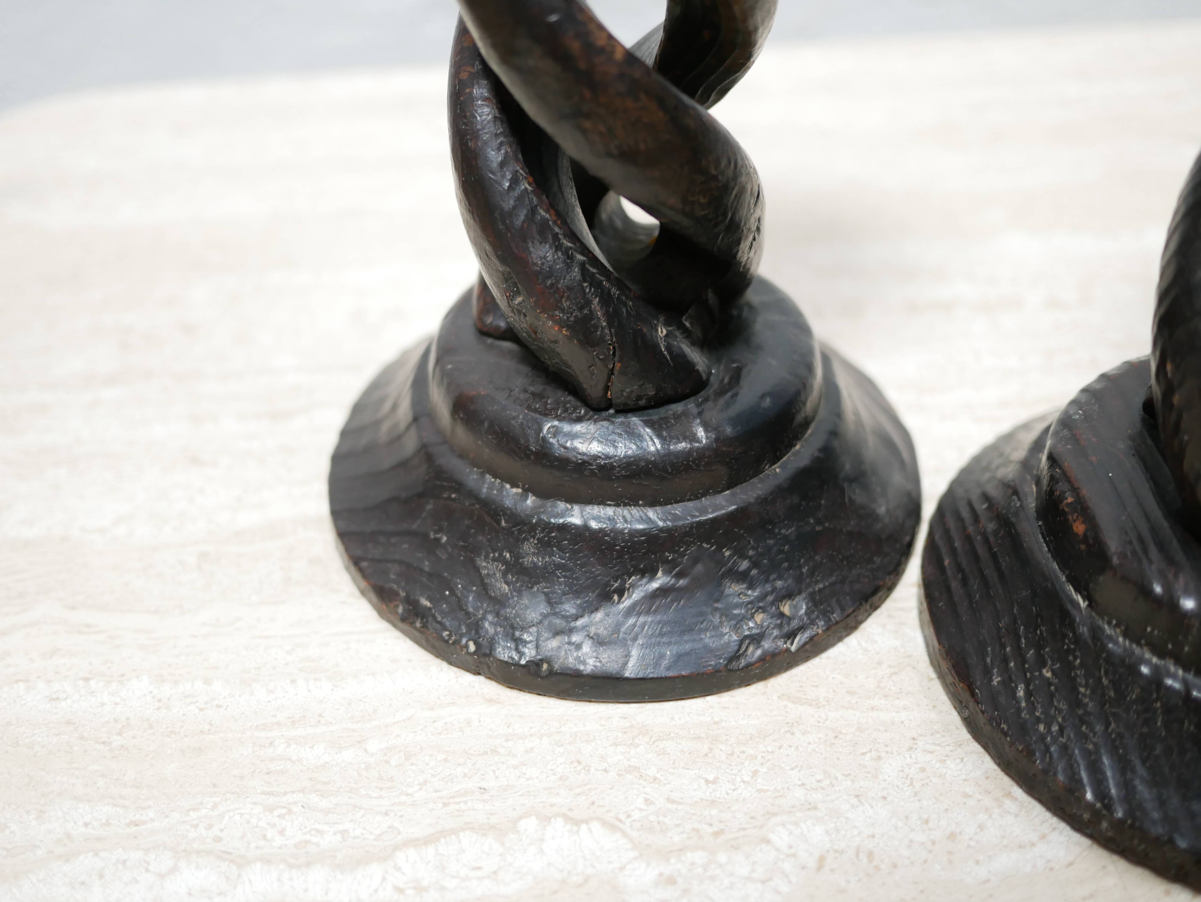 Pair of antique turned wooden candle holders
