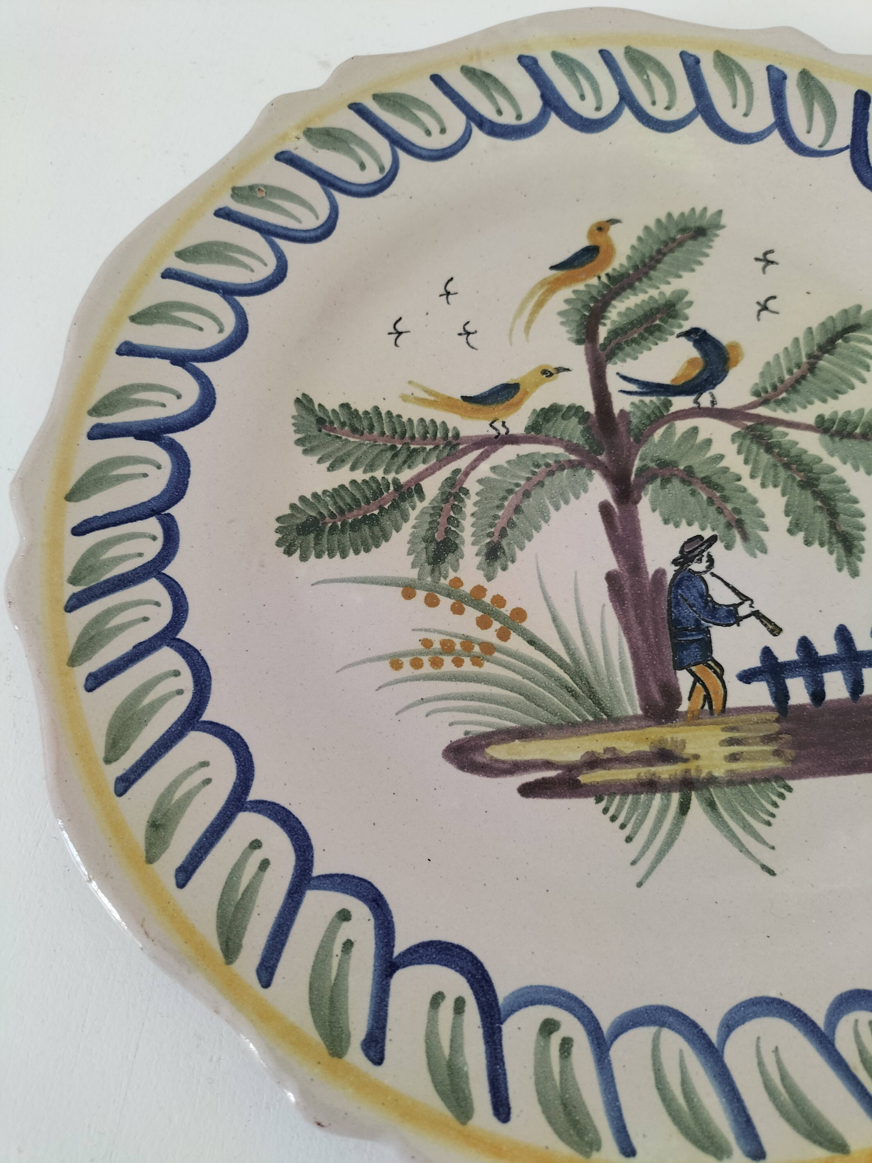 Antique hand-painted earthenware plate – piper and birds