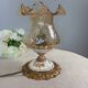 Baroque inspired table lamp, bronze, ceramic flowers and glass globe