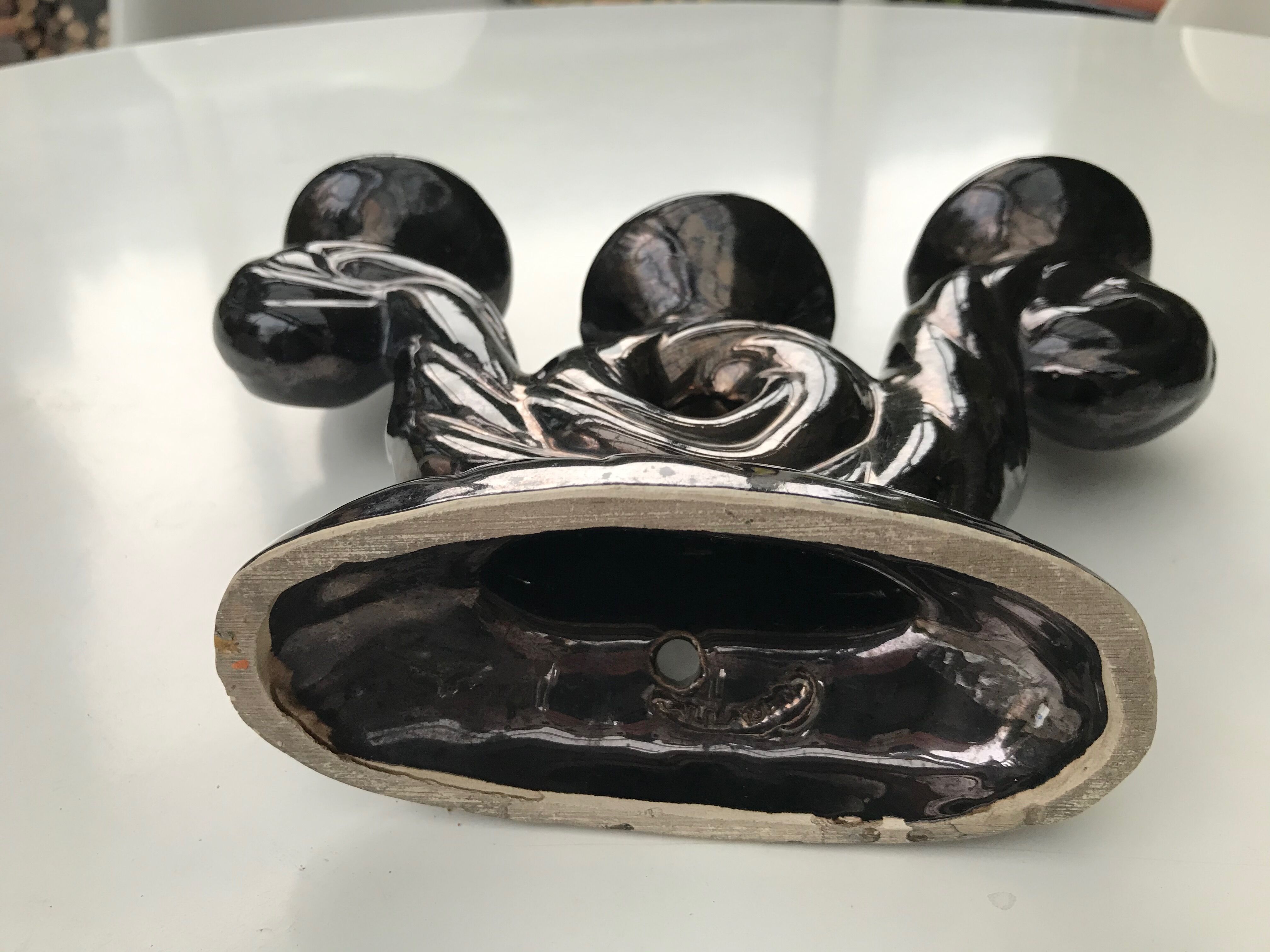 Former black ceramic candlestick signed Vallauris