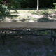 Pairs of benches in light wood and tubular metal