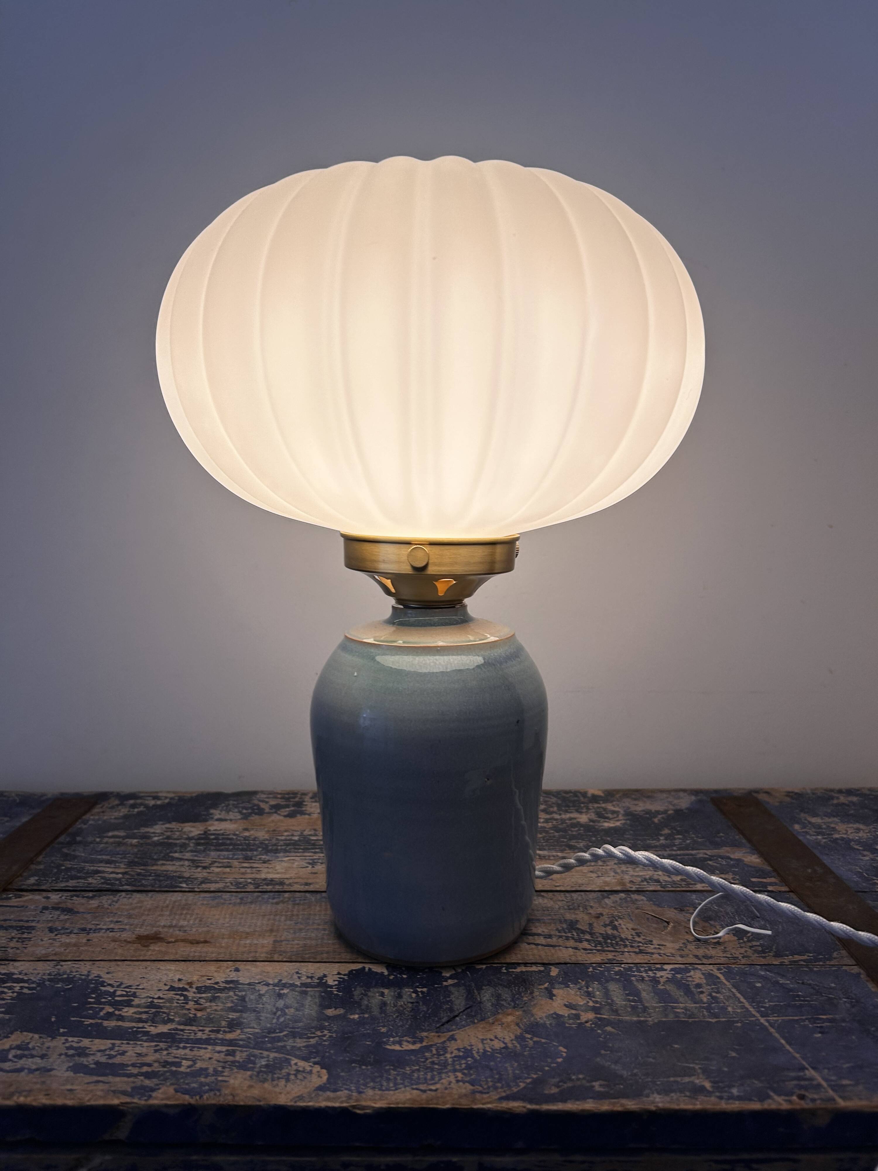 Table lamp in pastel blue and pleated opaline ceramic