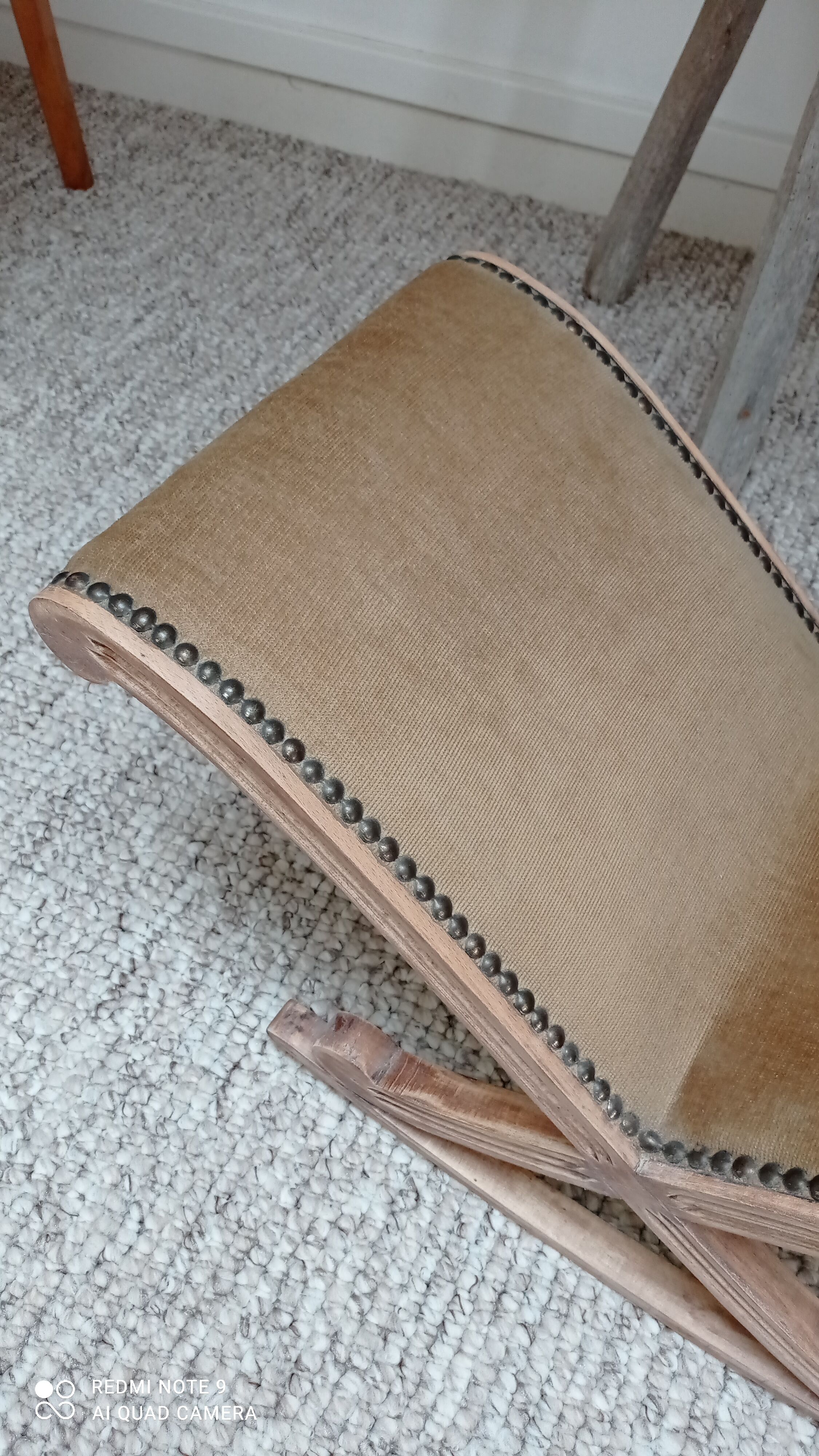 Footrest upholstered in wood