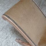 Footrest upholstered in wood