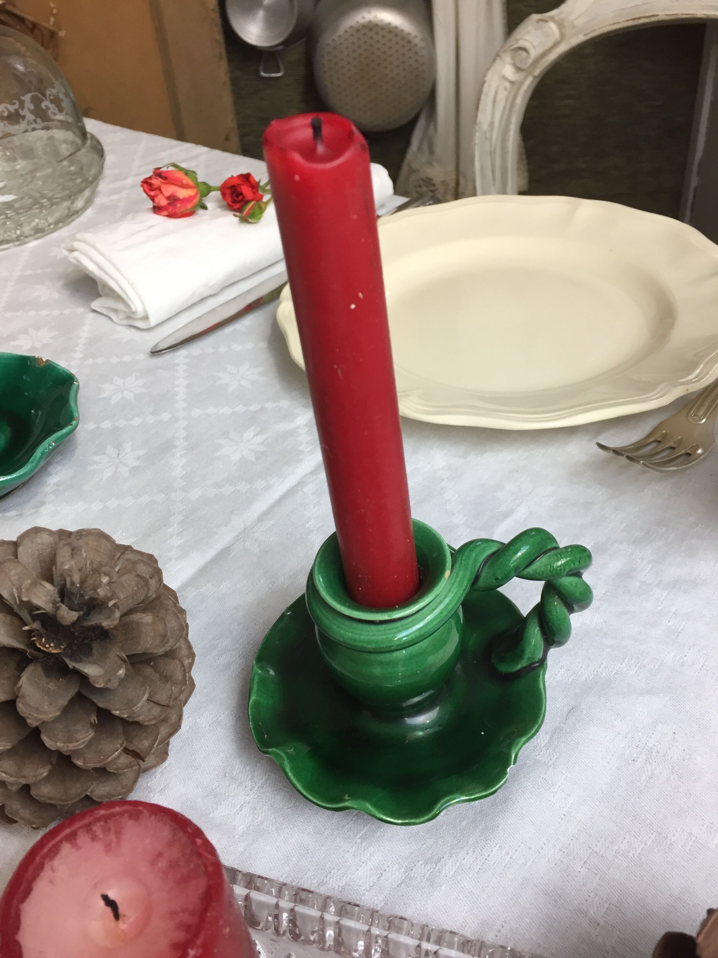 Old candleholder, glazed terracotta cellar, artisanal green color