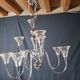 Chandelier from the 1930s to 1950s in chrome metal and thick glass.
