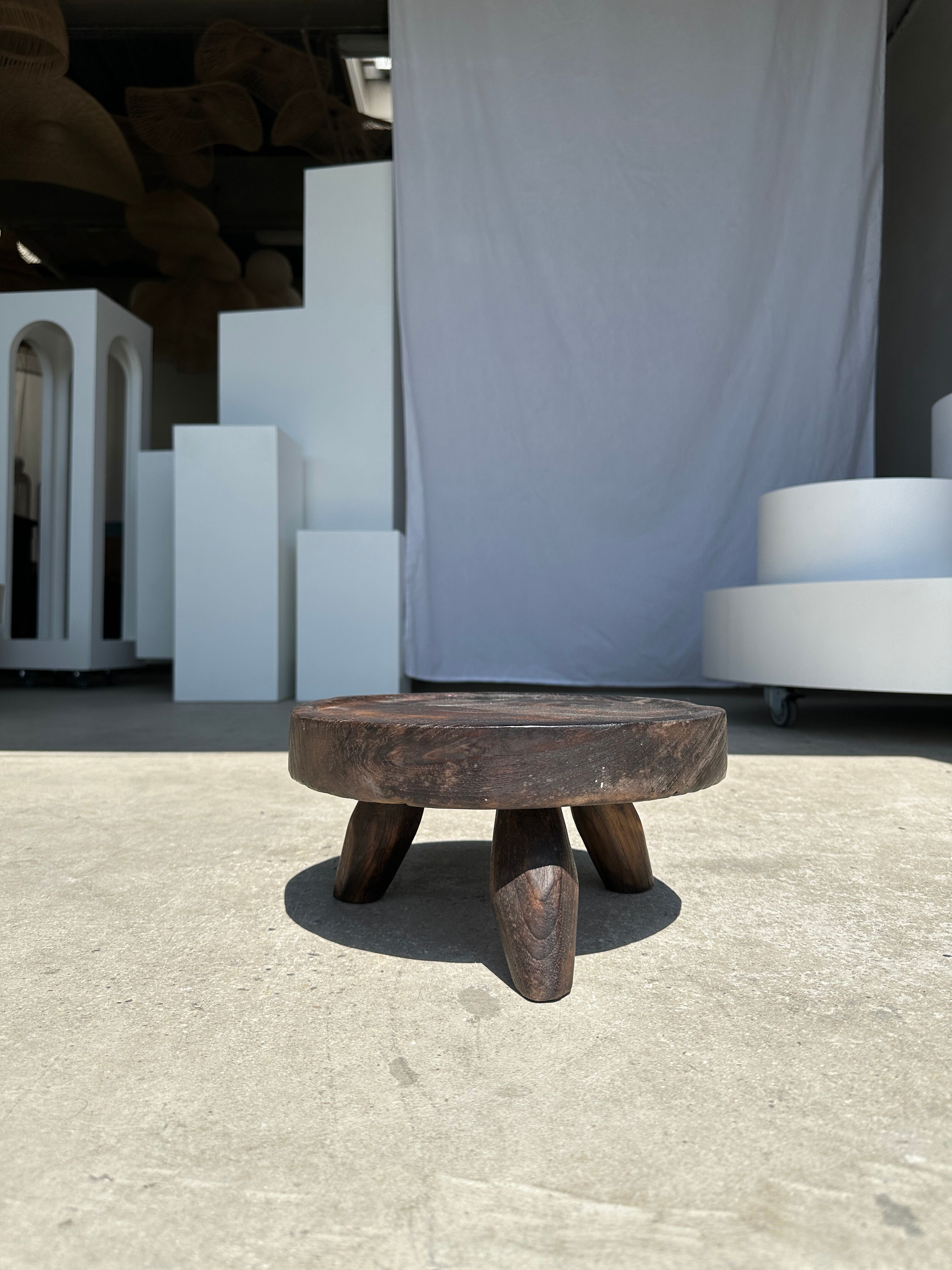 Small tripod stool low in dark brown upcycled teak