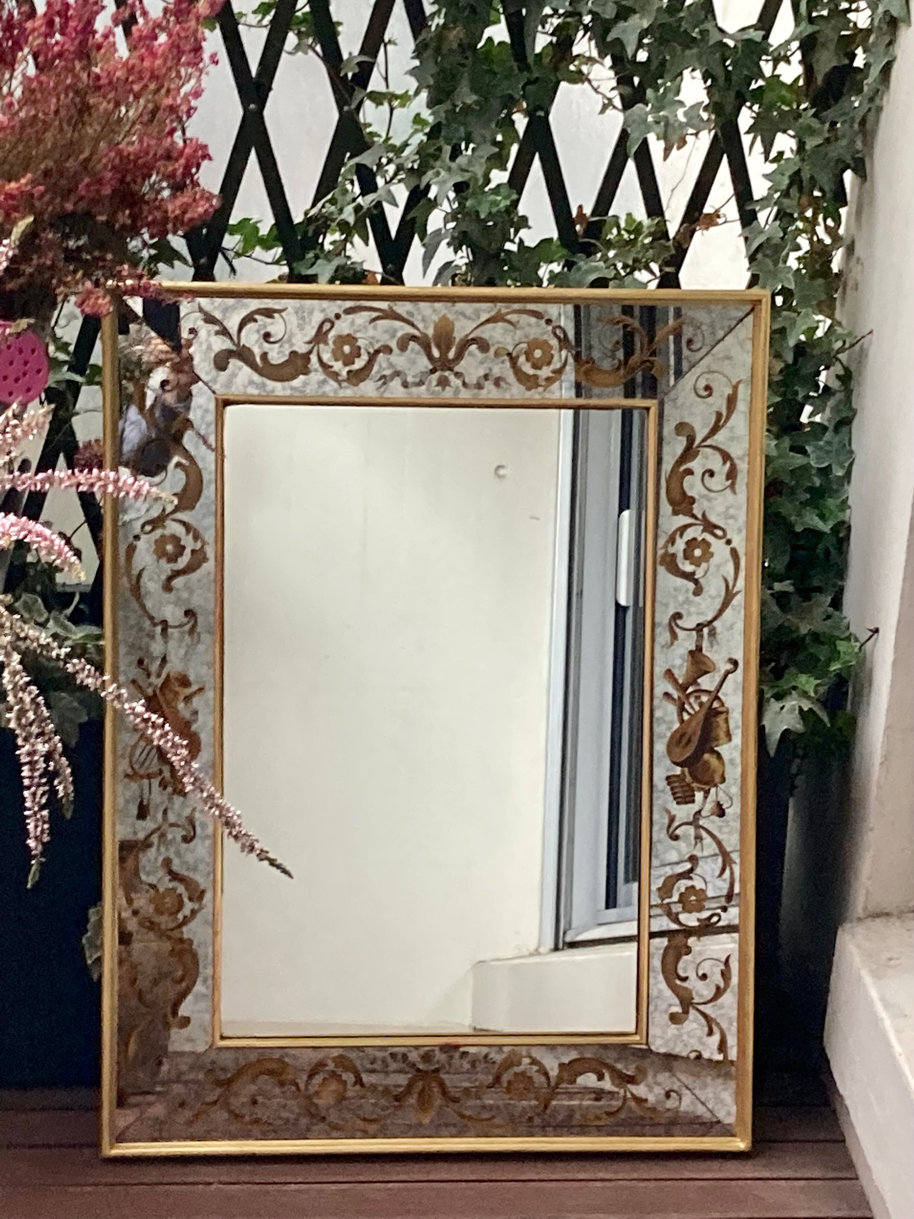 Antique mirror with parecloses and eglomised glass 18th century style