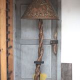 Liane and metal floor lamp with perforated leather shade featuring elephant patterns, lise.