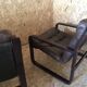 Pair of vintage armchairs in curved wood with suspended seat circa 1970-80.