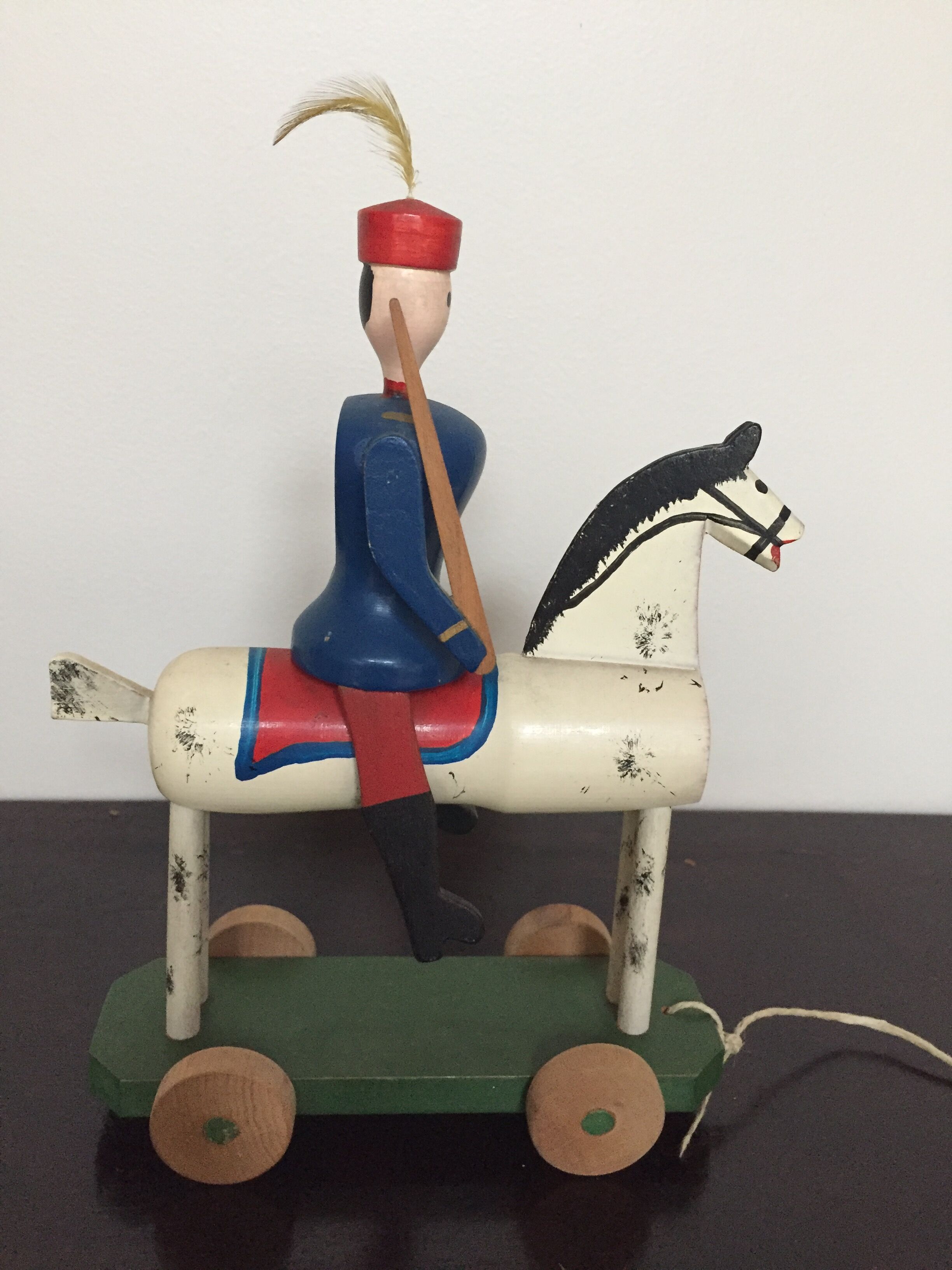 Soldier on wooden horse to shoot