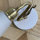 Pair of brass swan neck wall lights with white opaline glass tulip