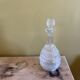 Blown glass decanter and relief decoration