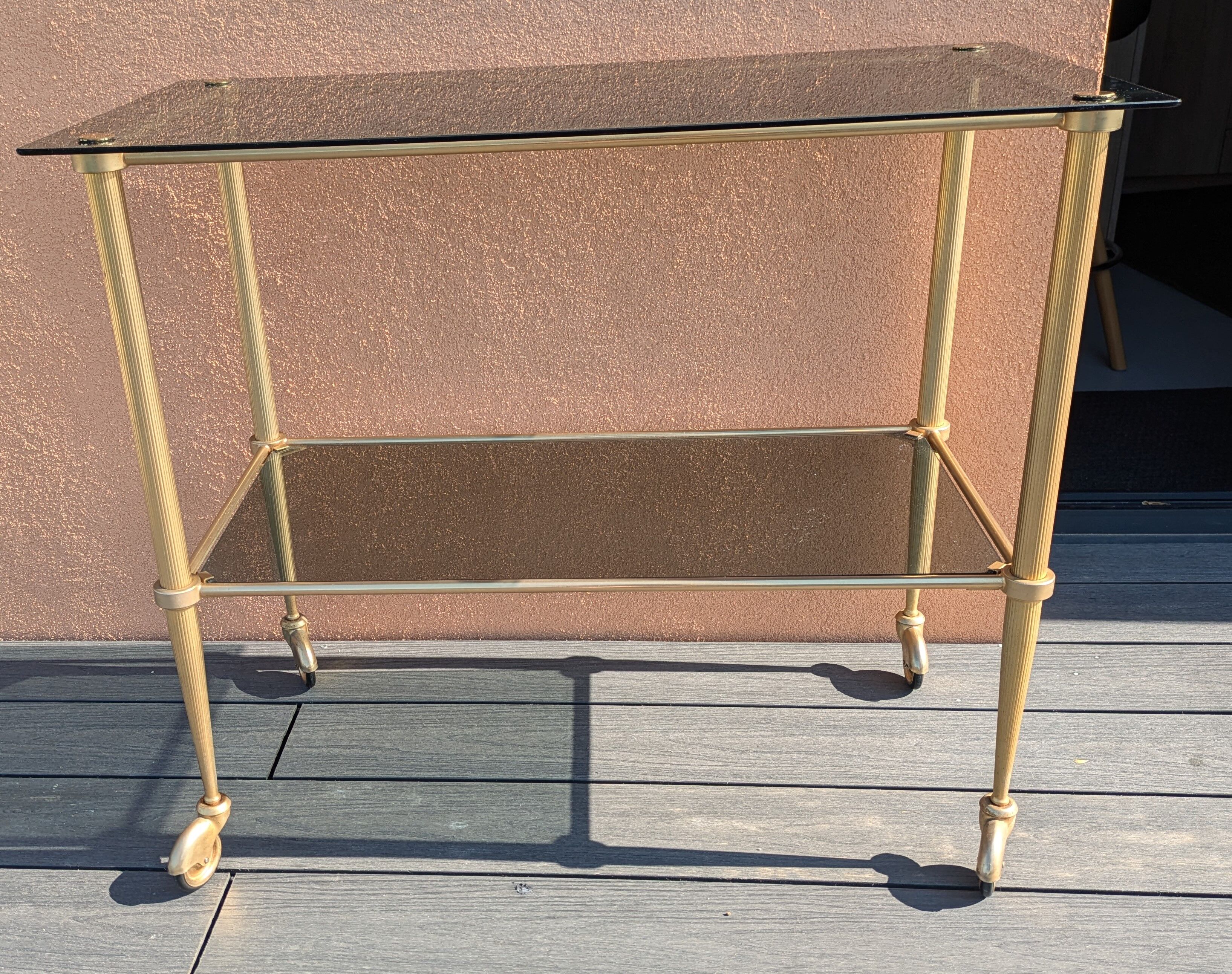 Smoked glass and brass dessert table