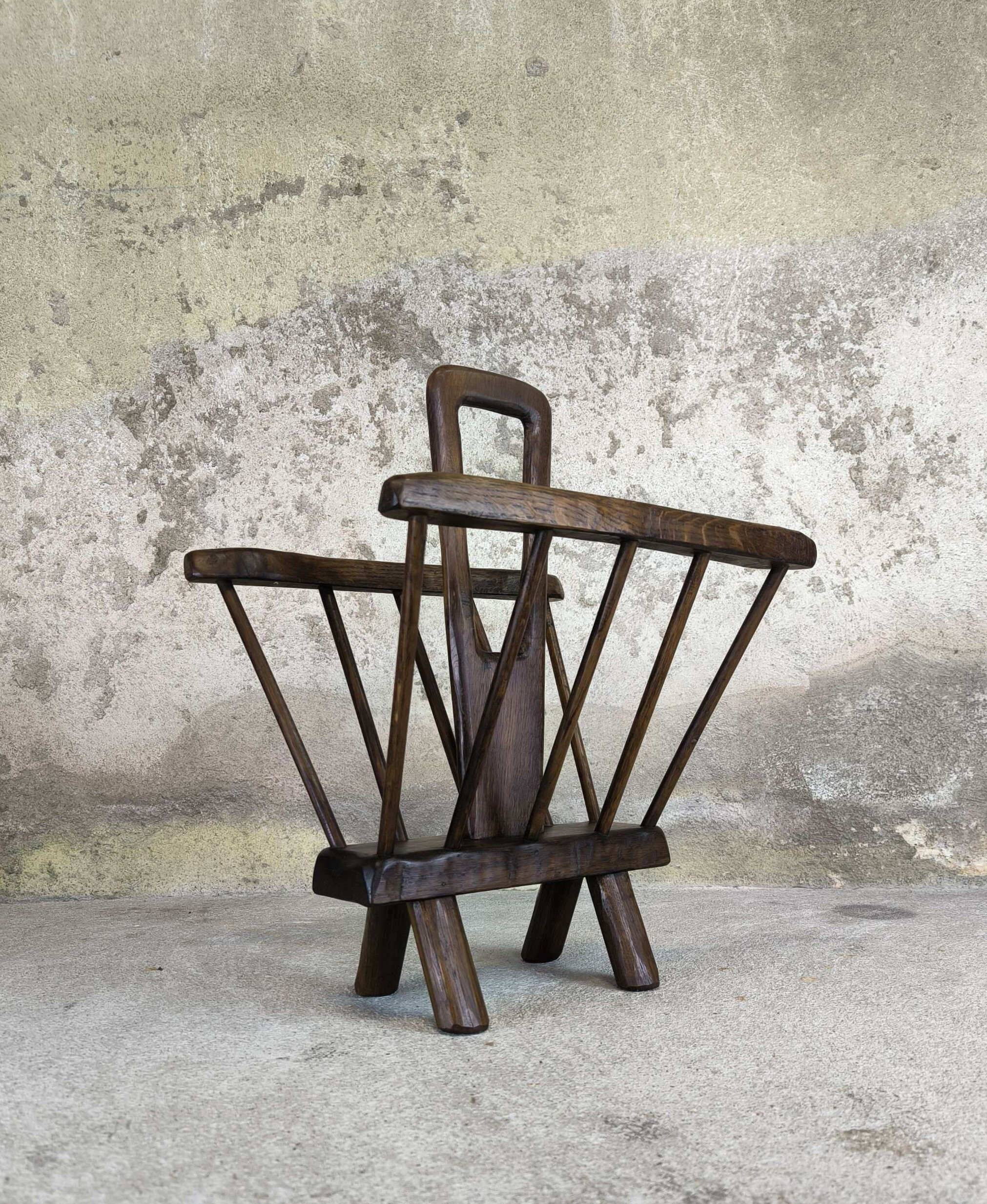 Vintage magazine rack in solid wood.