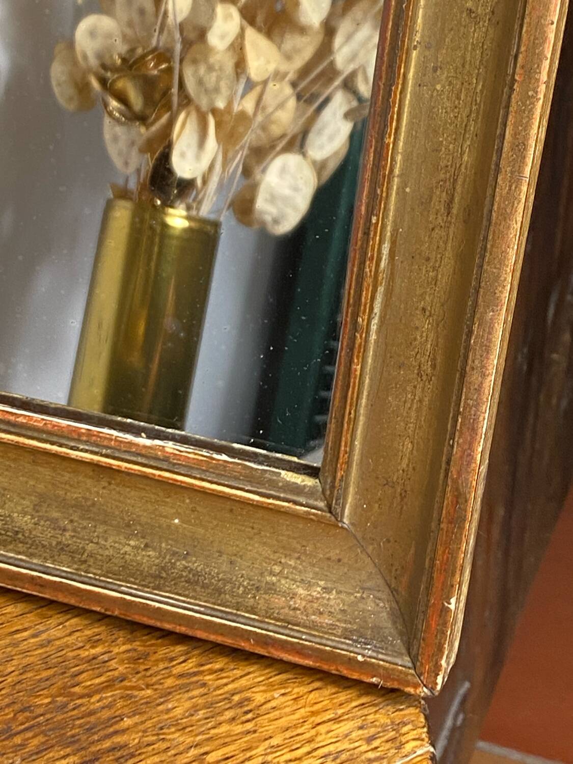 Antique mirror in gilded wood