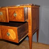 Louis XVI style chest of drawers with music attributes