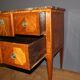 Louis XVI style chest of drawers with music attributes