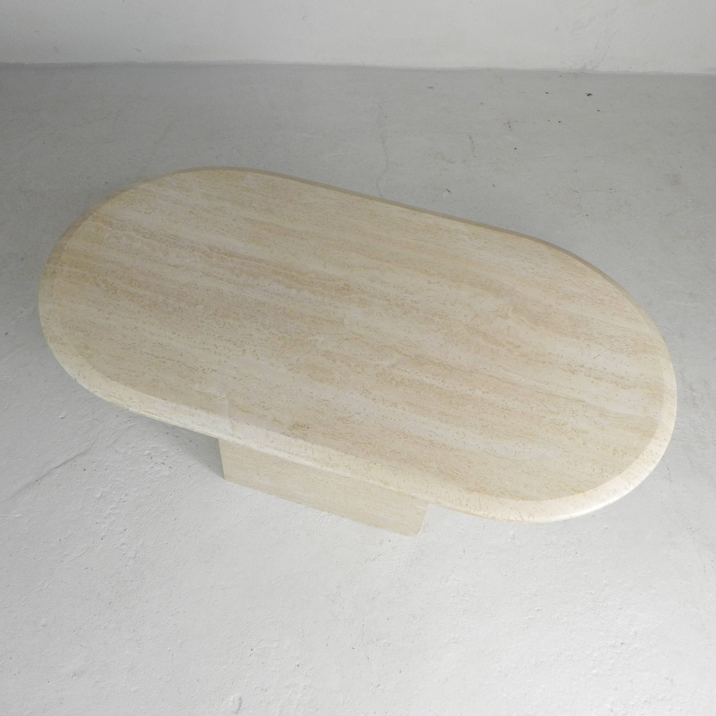 Mid-Century travertine coffee table with an oval top, 1970s.