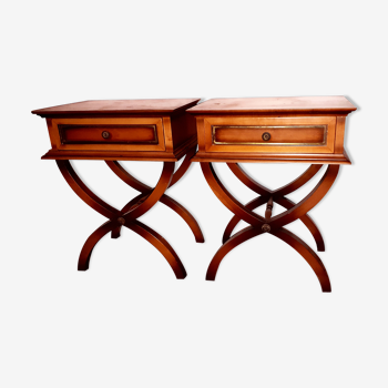 Pair of empire style bedside tables, crossed feet