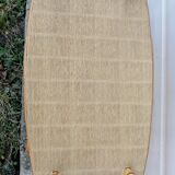 Rattan table at the end of the sofa