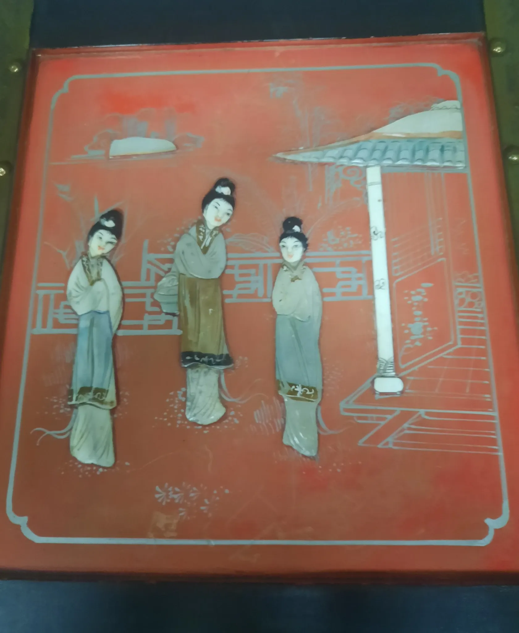 Red lacquered wooden mallet from the Far East.