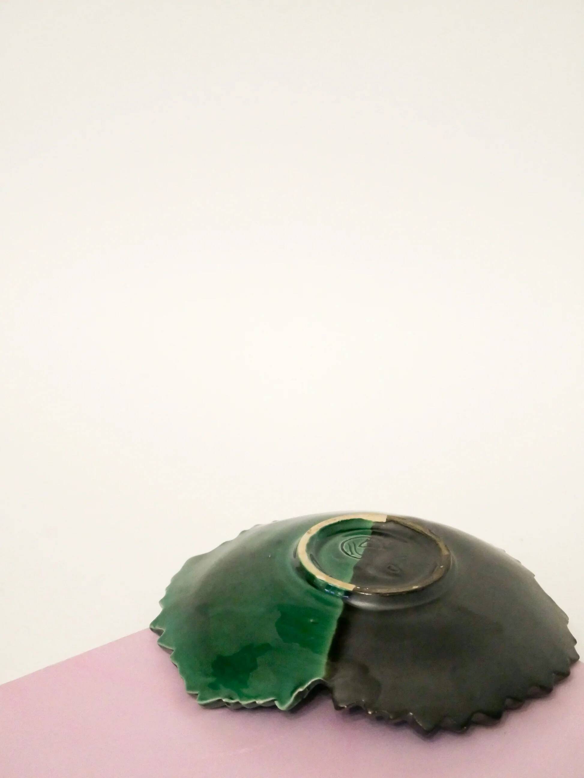 Two-tone ceramic leaf dish, green and black, signed, 1960.