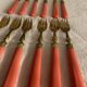 Set of 12 coral and gold dessert forks