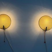 Pair of green plexiglass and gold metal wall lights by Erco, 1950s, Germany.