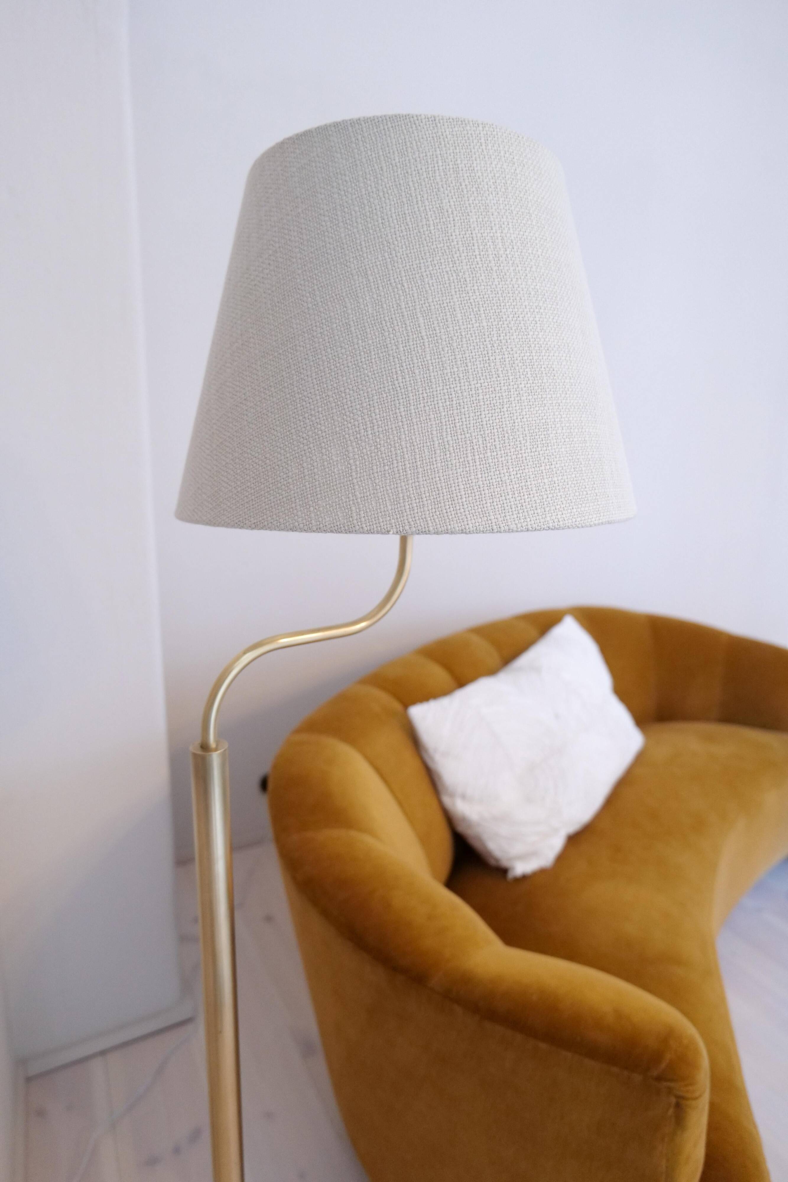 Sculptural modern brass floor lamps from the mid-century Luxus, Sweden, 1970s.