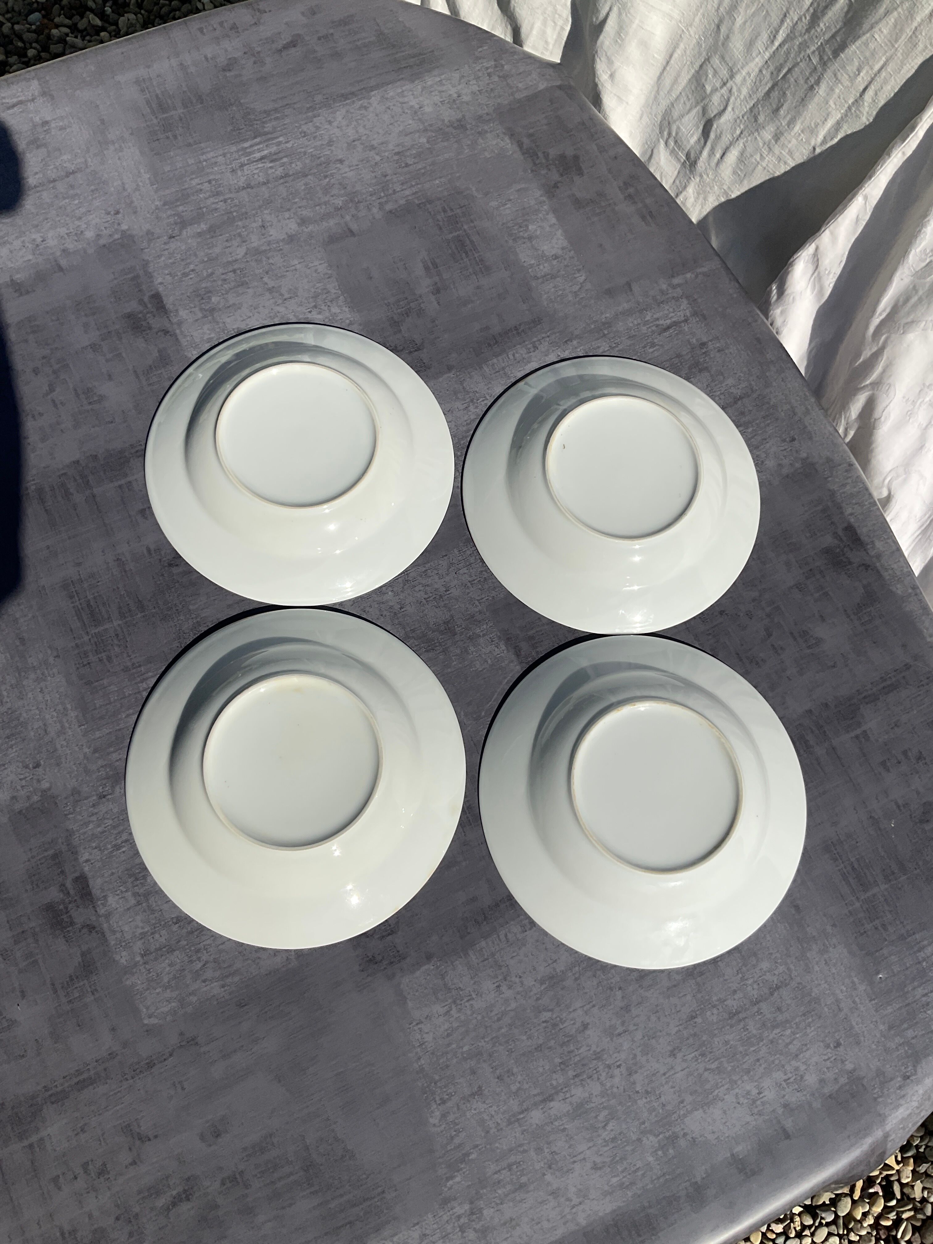 Vintage white hollow plates with purple polka dots