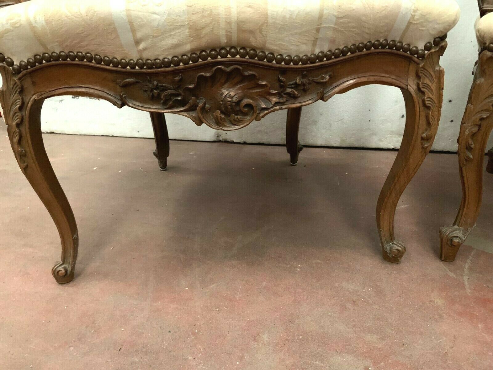 Pair of 20th century walnut rock armchairs