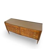 Veneered burl walnut chest of drawers with light warm brown glass top