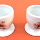 Ulysse Paris porcelain egg cup for Chanill with floral decoration.