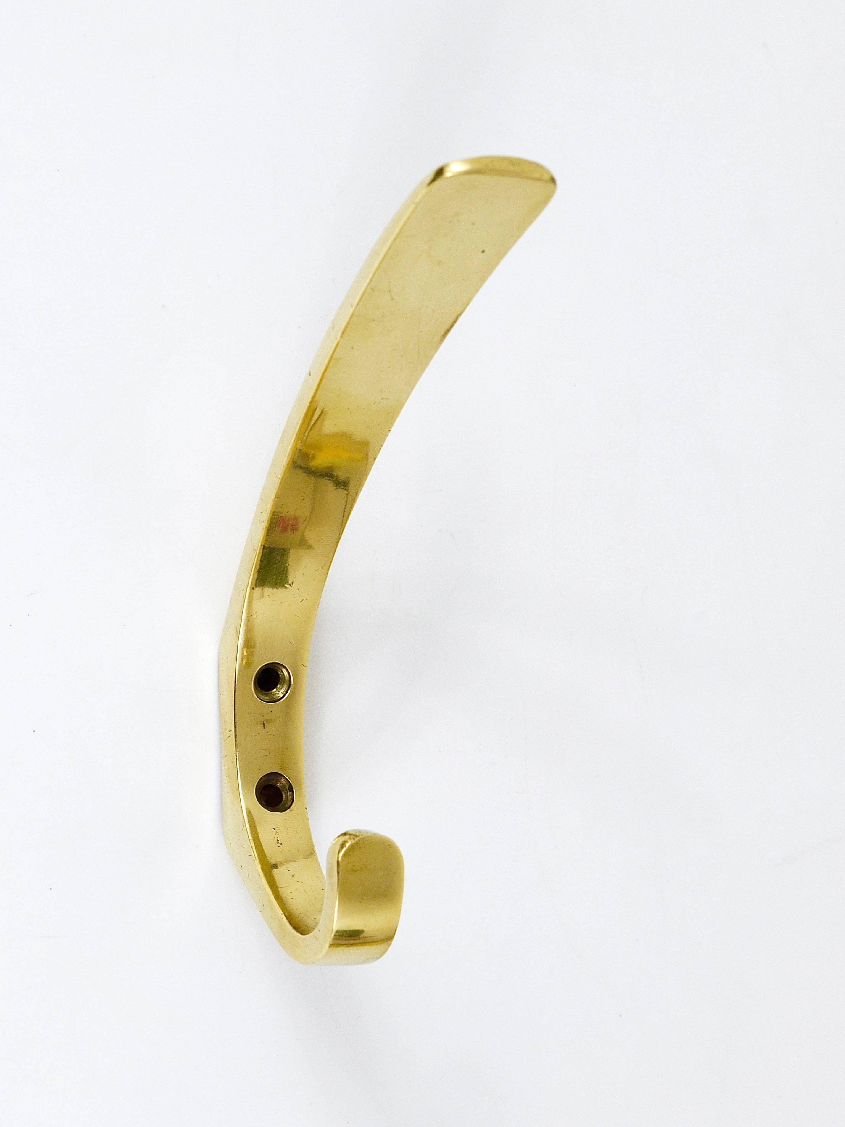 9 vintage brass wall hooks by Herta Baller, Vienna, Austria, 1950s.