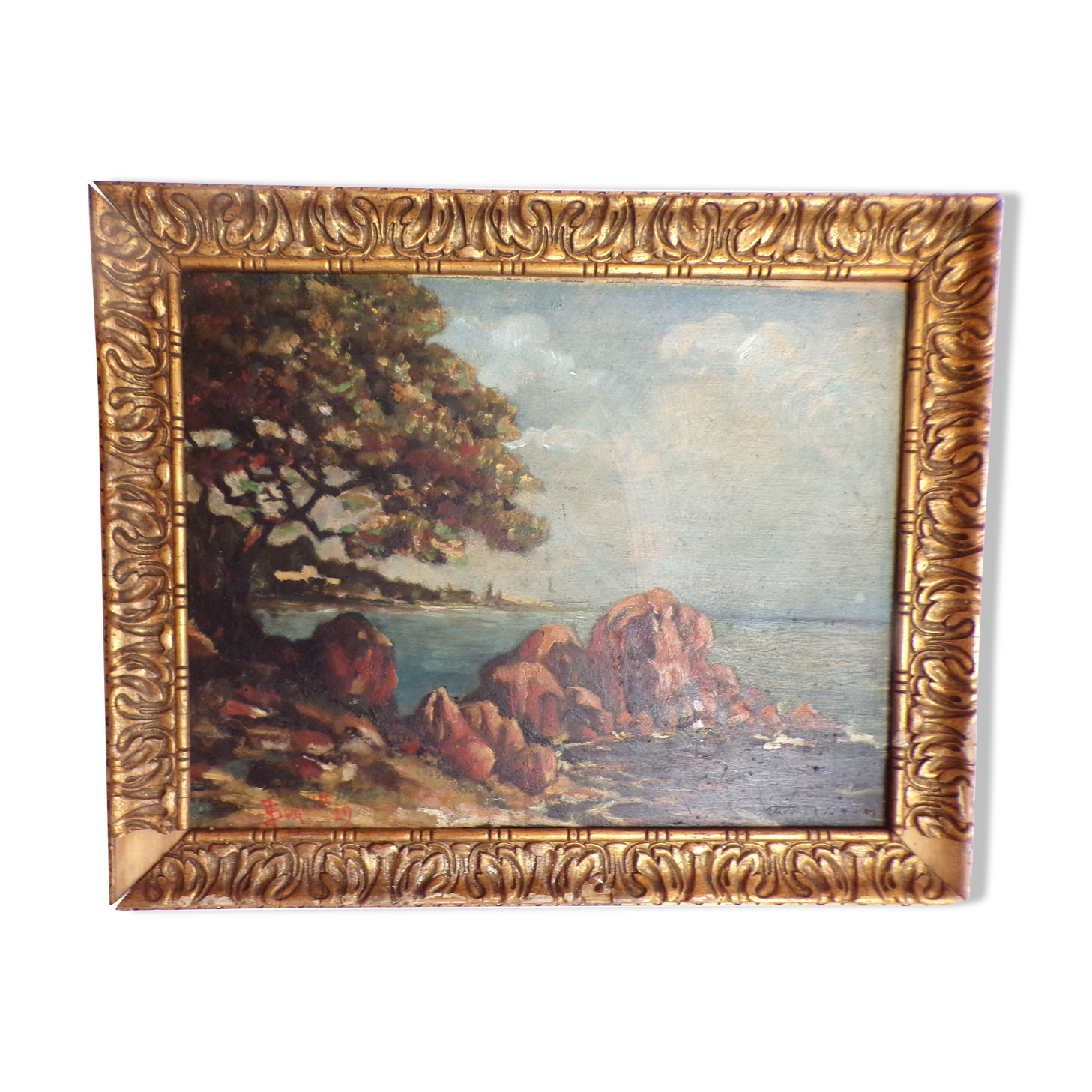Signed seaside landscape painting dated 1929