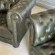 Title: Pair of vintage olive green leather Chesterfield armchairs