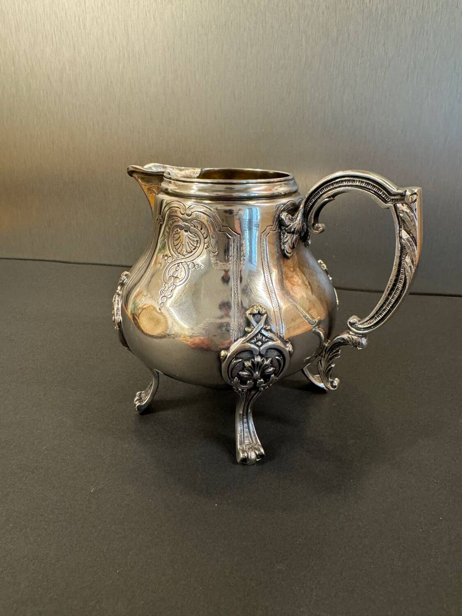 Antique silver-plated metal milk jug – Rococo style, chased decoration, early