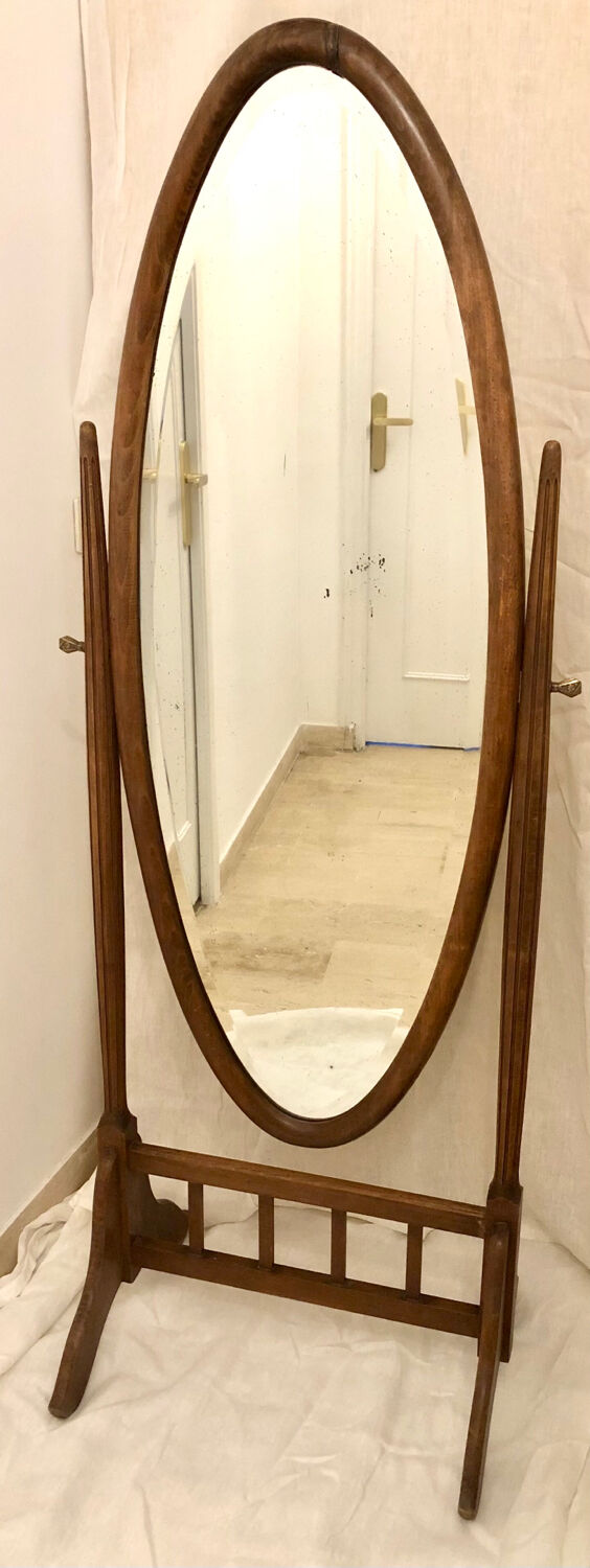 Old large psychic mirror on wooden stand