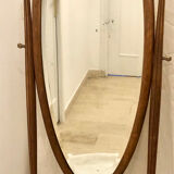 Old large psychic mirror on wooden stand