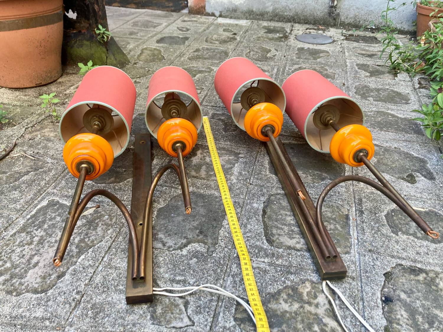 Large pair of wall sconces in brass and orange opaline glass