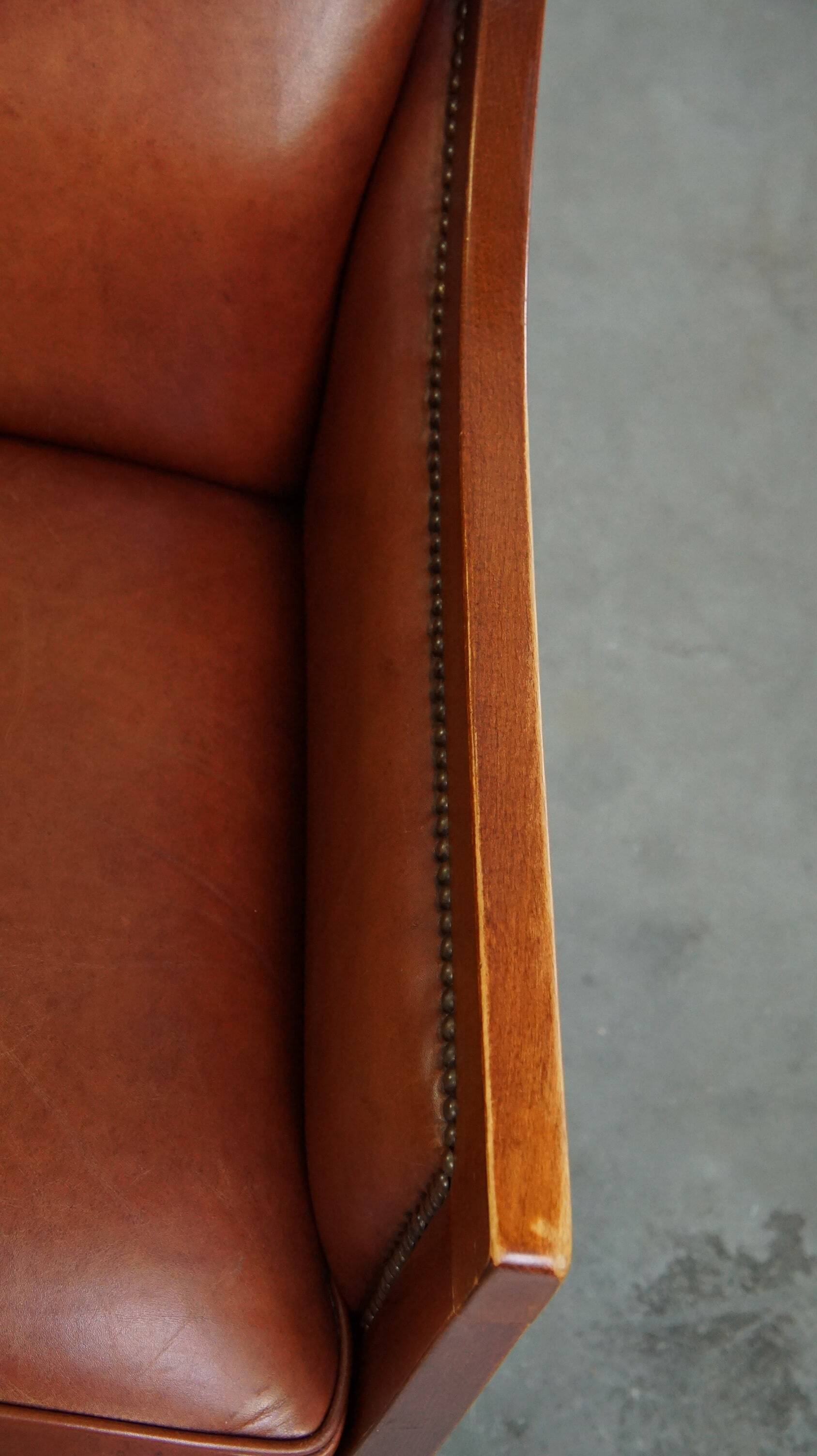 Set of 2 cognac-colored cowhide Art Deco design armchairs