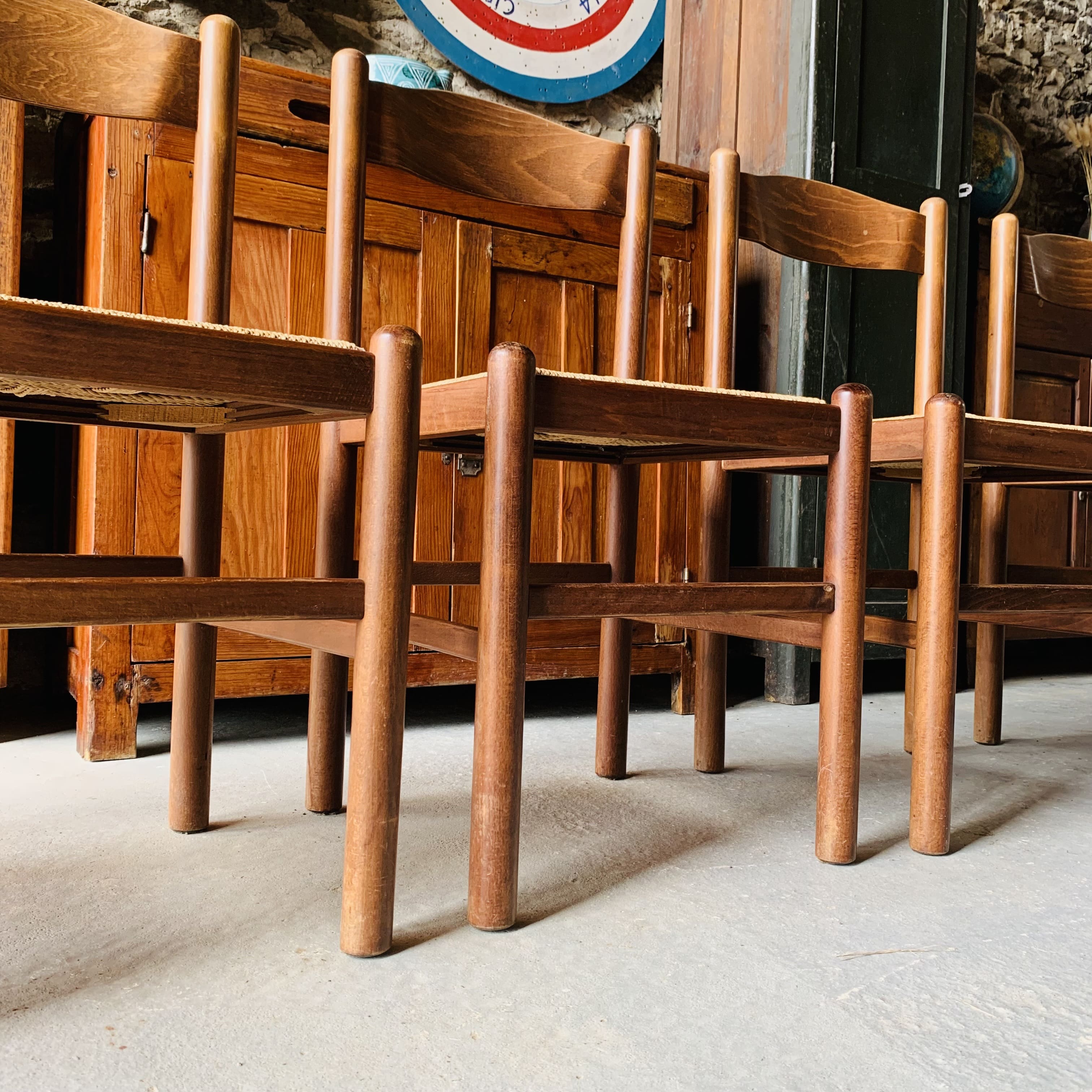 5 chairs made of wood and rope