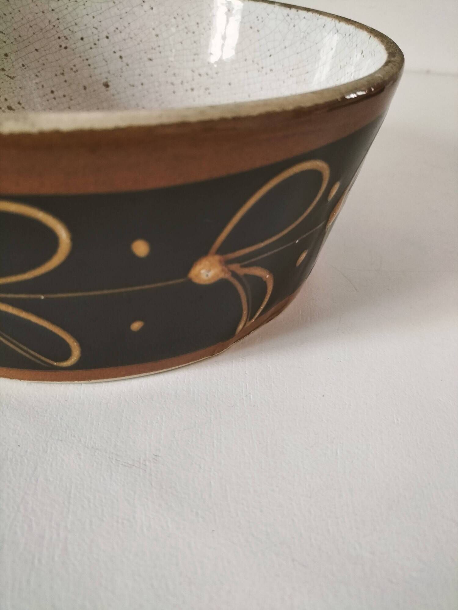 Vintage dish with black and ochre decoration and a speckled crackled interior – 1970s